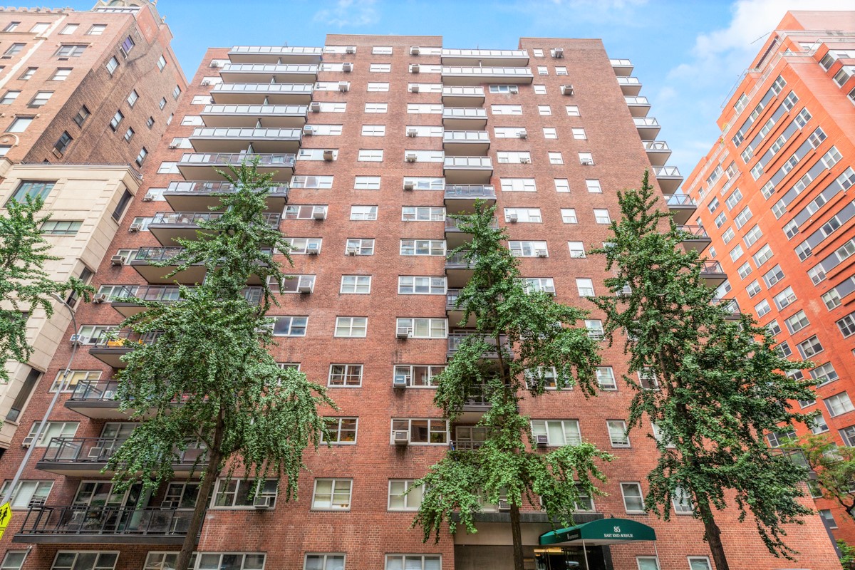 Brick building exterior at 85 East End Avenue NYC, luxury apartments in Upper East Side.
